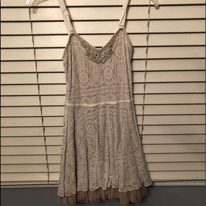 Tan Lacy dress with beading around neckline